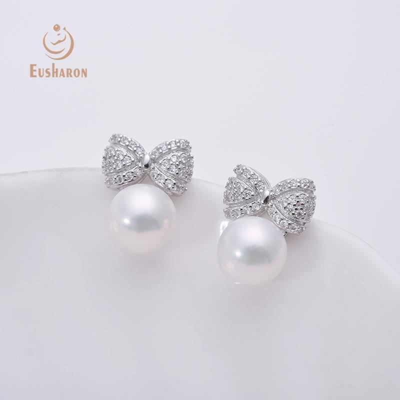 round white freshwater pearl and bowknot earring stud